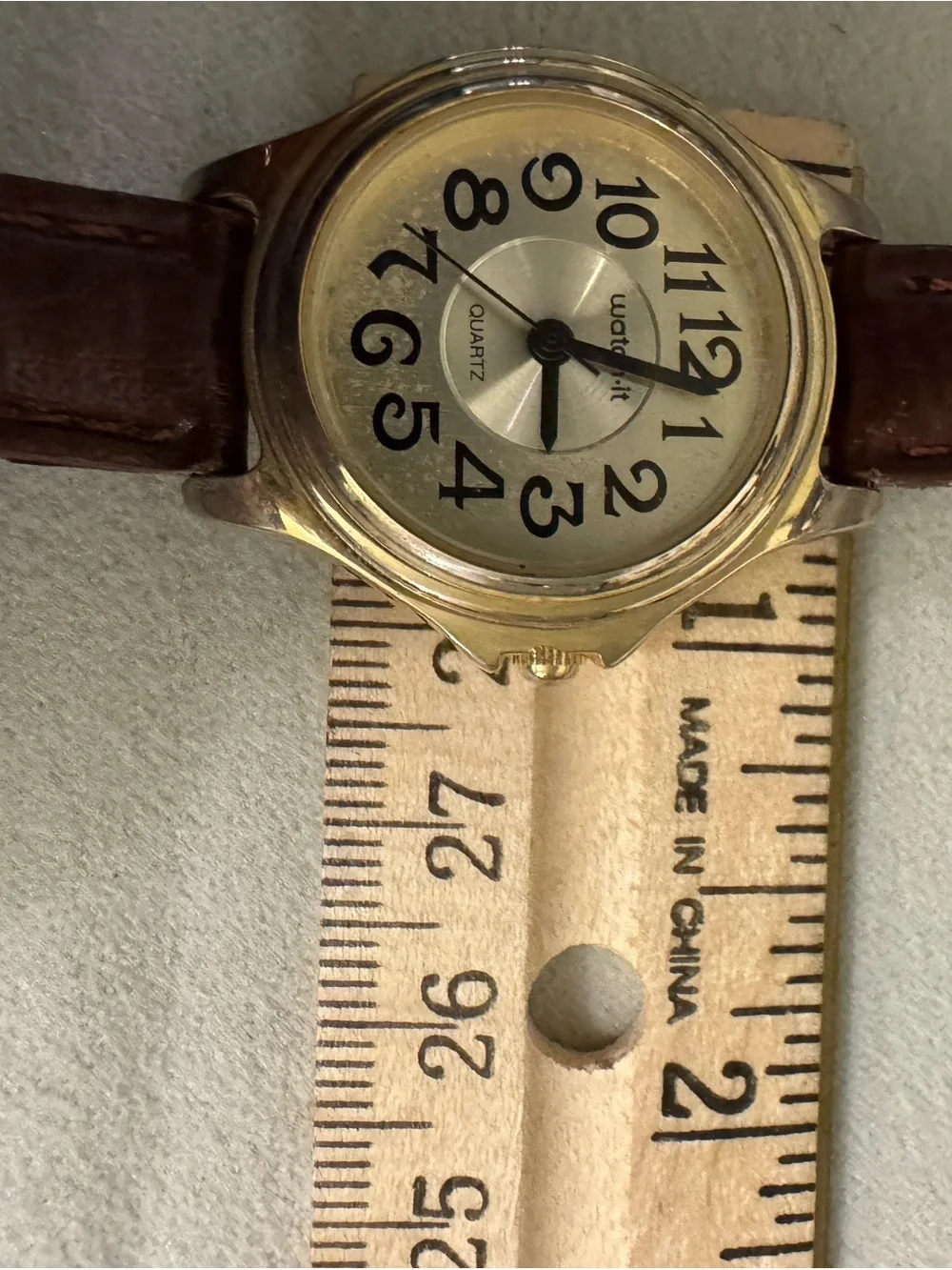 Watch•It gold tone